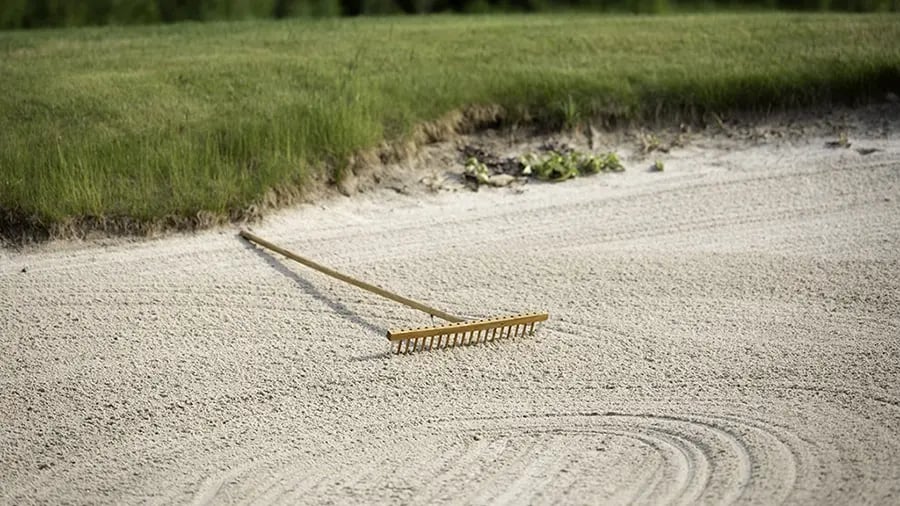 sand rake in bunker