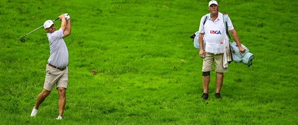 Persons in Mid-Am Quarters, after Beating the Guy Who Beat the Co-Medalist